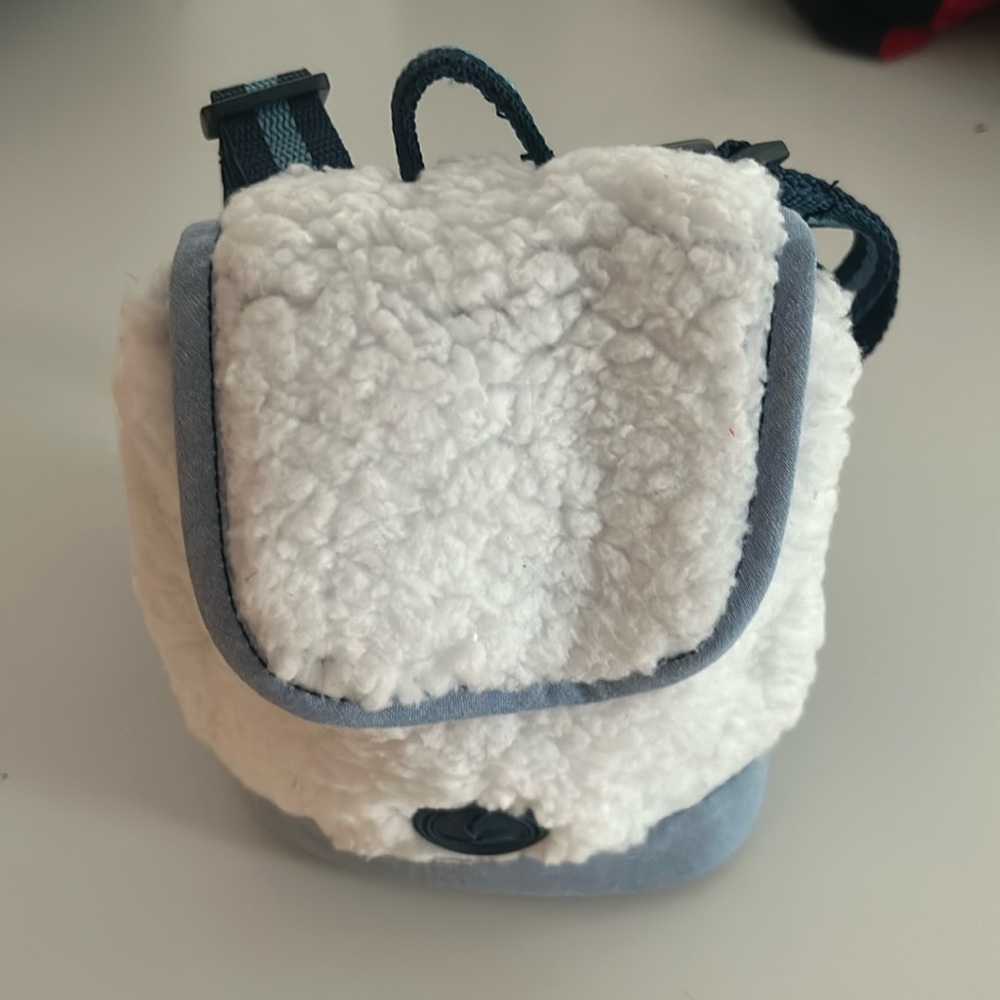 12.5-18 in circumference around front legs. Adventure pack for little dogs!